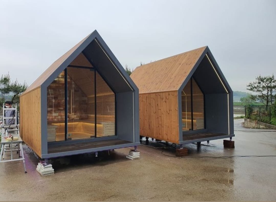 Completed A-frame homes ready for delivery